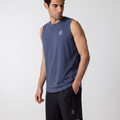 Man wearing a sleeveless navy shirt and black shorts on a white background